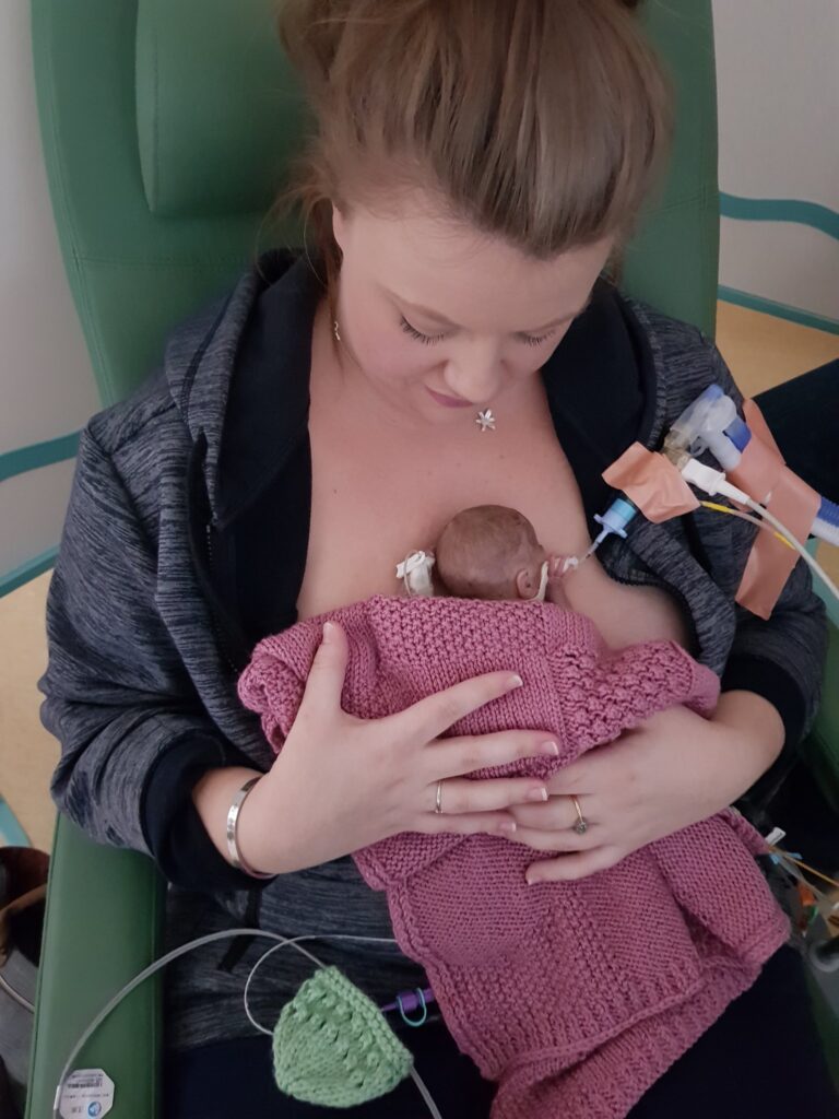 Tayla Esgate-Menear holding her daughter Lilly, having spent Christmas in NICU